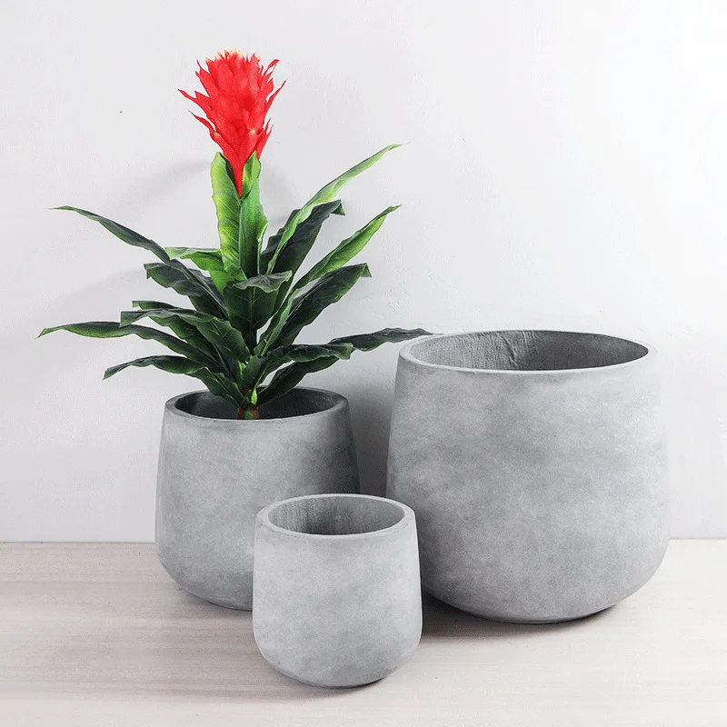 Large set of 4 concrete outdoor pots