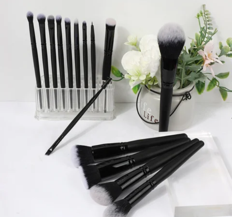 Black makeup brush set with included storage bag