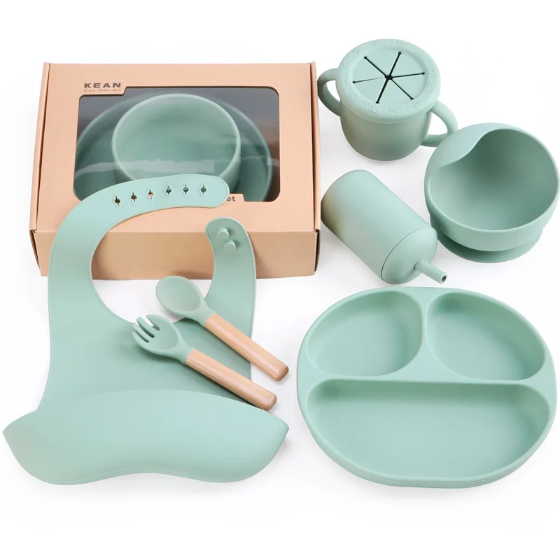 Silicone baby feeding set - neutral colours, non-slip bowls and wooden handle cutlery