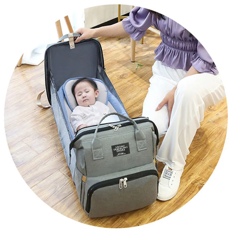 Foldable baby travel crib and storage bag for busy on the go parents