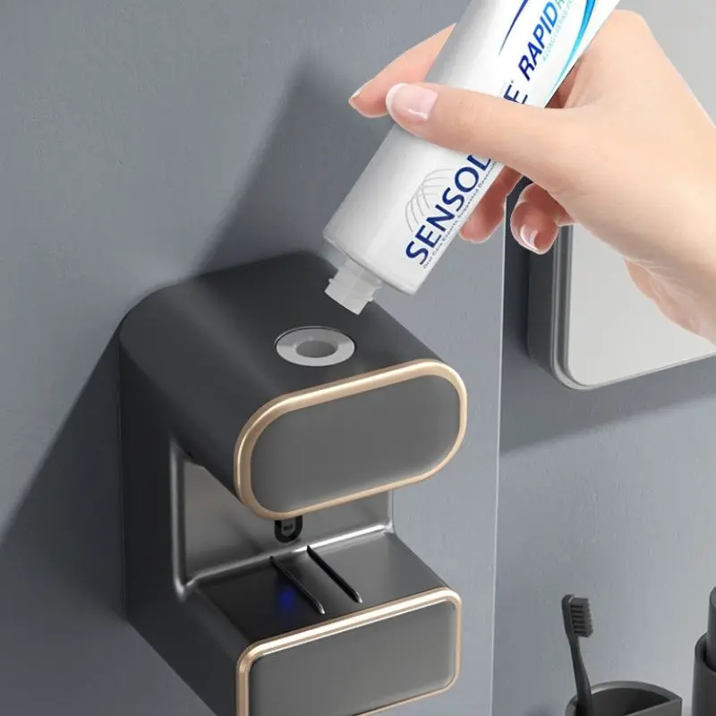 Automatic detection toothpaste dispenser with UV light cleaning toothbrush holder