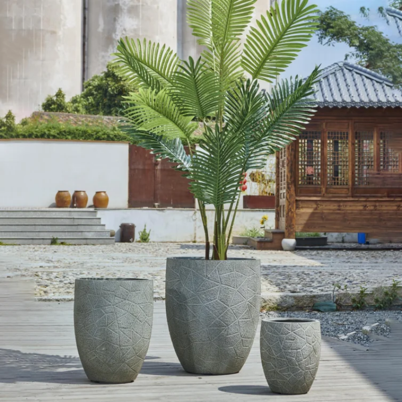 Large set of 4 concrete outdoor pots