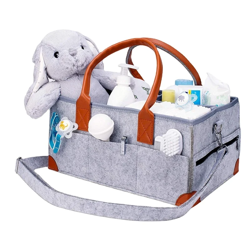 Large capacity storage caddy for nappies, bottles and lotions - with added strap for convenience and portability