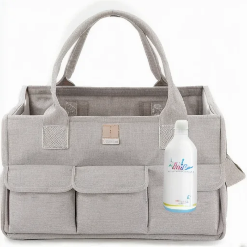 Large capacity storage caddy for nappies, bottles and lotions - with added strap for convenience and portability