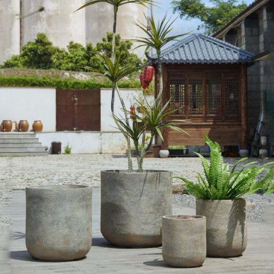 Large set of 4 concrete outdoor pots