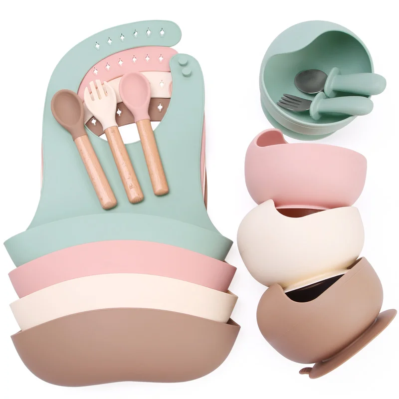 Silicone baby feeding set - neutral colours, non-slip bowls and wooden handle cutlery